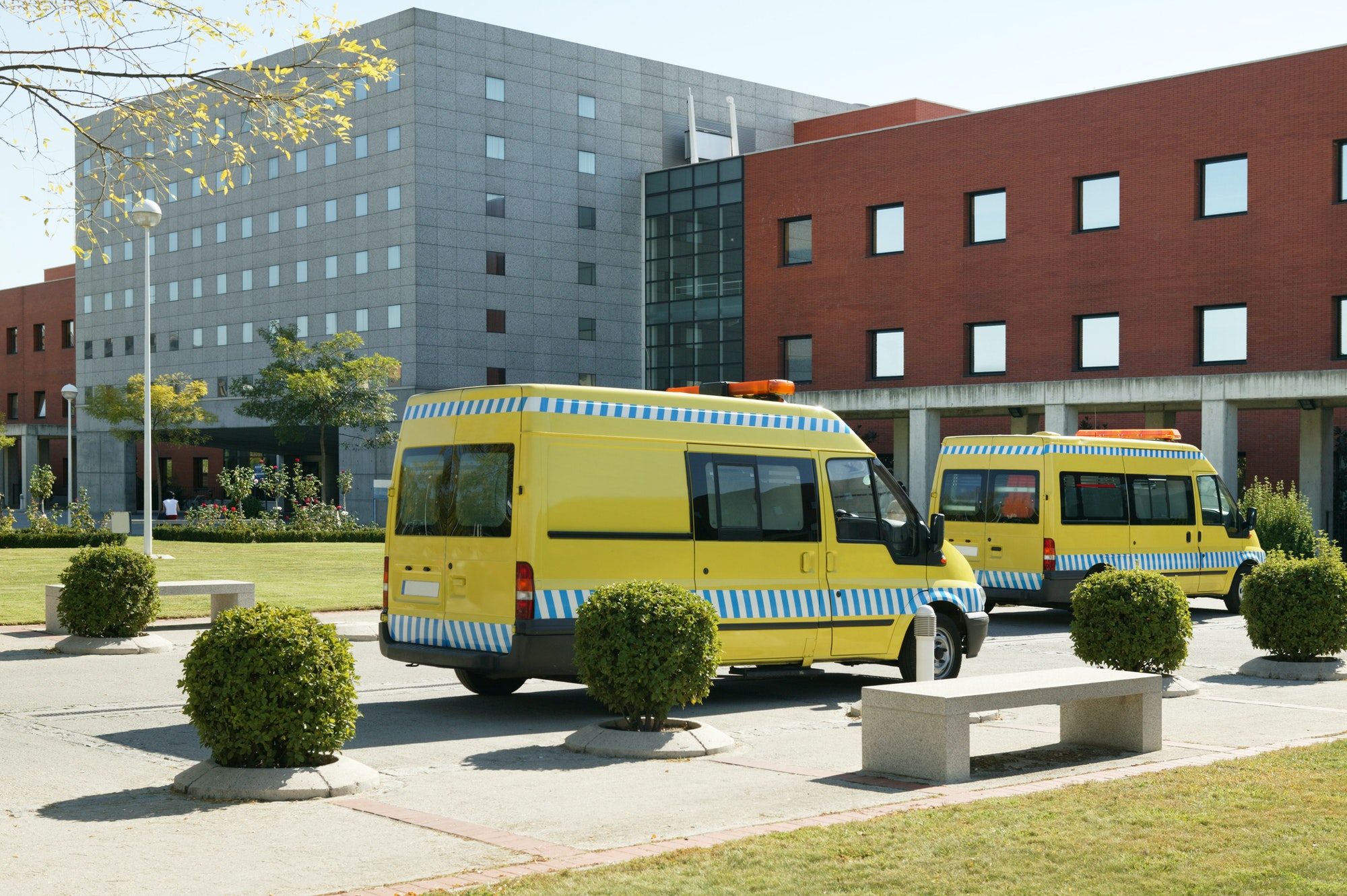 Ambulance vehicles on an hospital parking. Emergency transport. Medicine